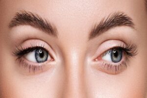 Close-up of woman's eyelids that show symmetry after corrective surgery